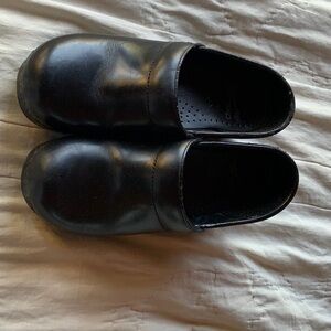 Dansko black leather clogs